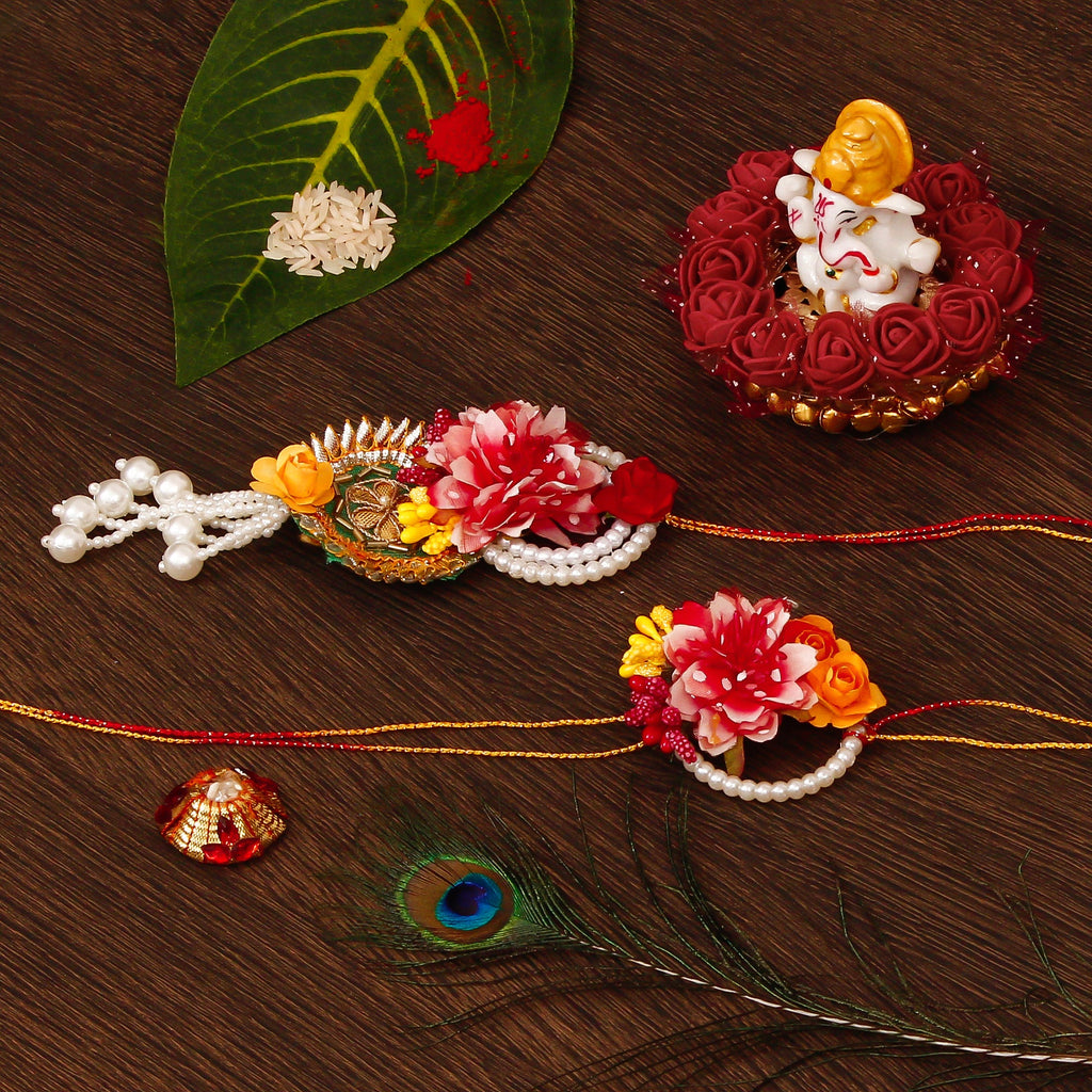 Floral Bhaiya Bhabhi Rakhi with Lord Ganesha Idol on Decorative Plate for Car & Home and Roli Tikka Matki Kafalo