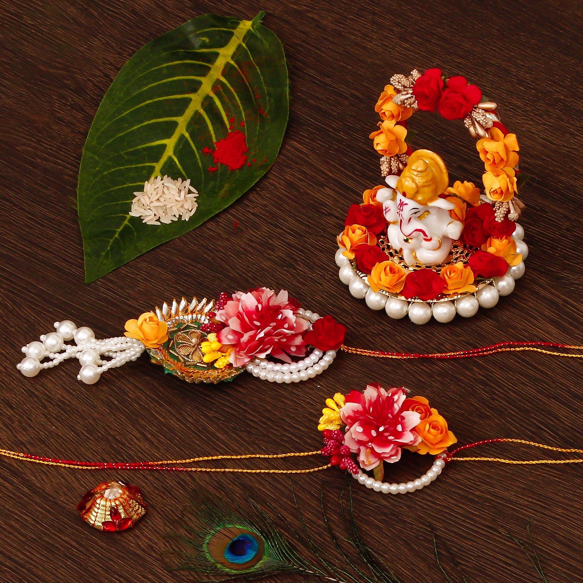 Floral Bhaiya Bhabhi Rakhi with Lord Ganesha Idol on Decorative Plate for Car & Home and Roli Tikka Matki Kafalo