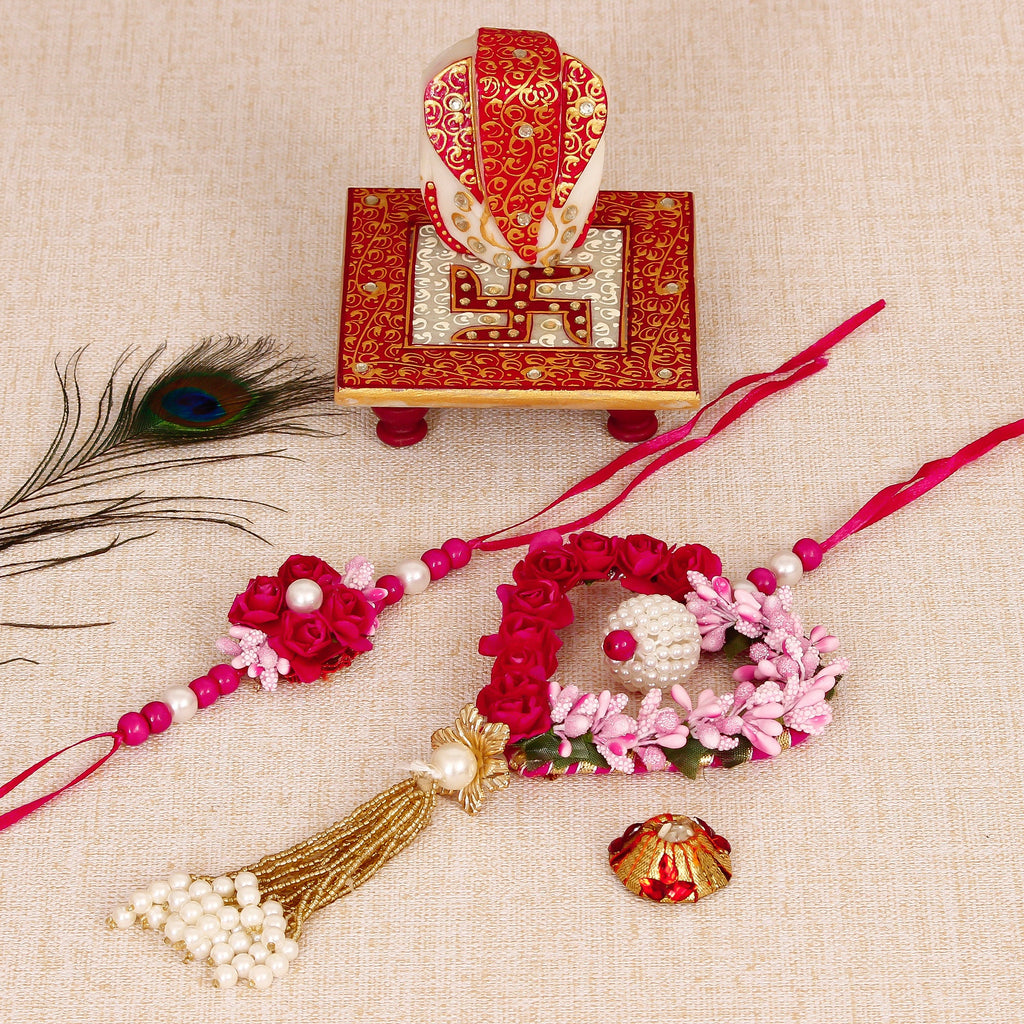 Floral and Heart Shape Bhaiya Bhabhi Rakhi with Ridhi Sidhi Marble chowki and Roli Tikka Matki Kafalo