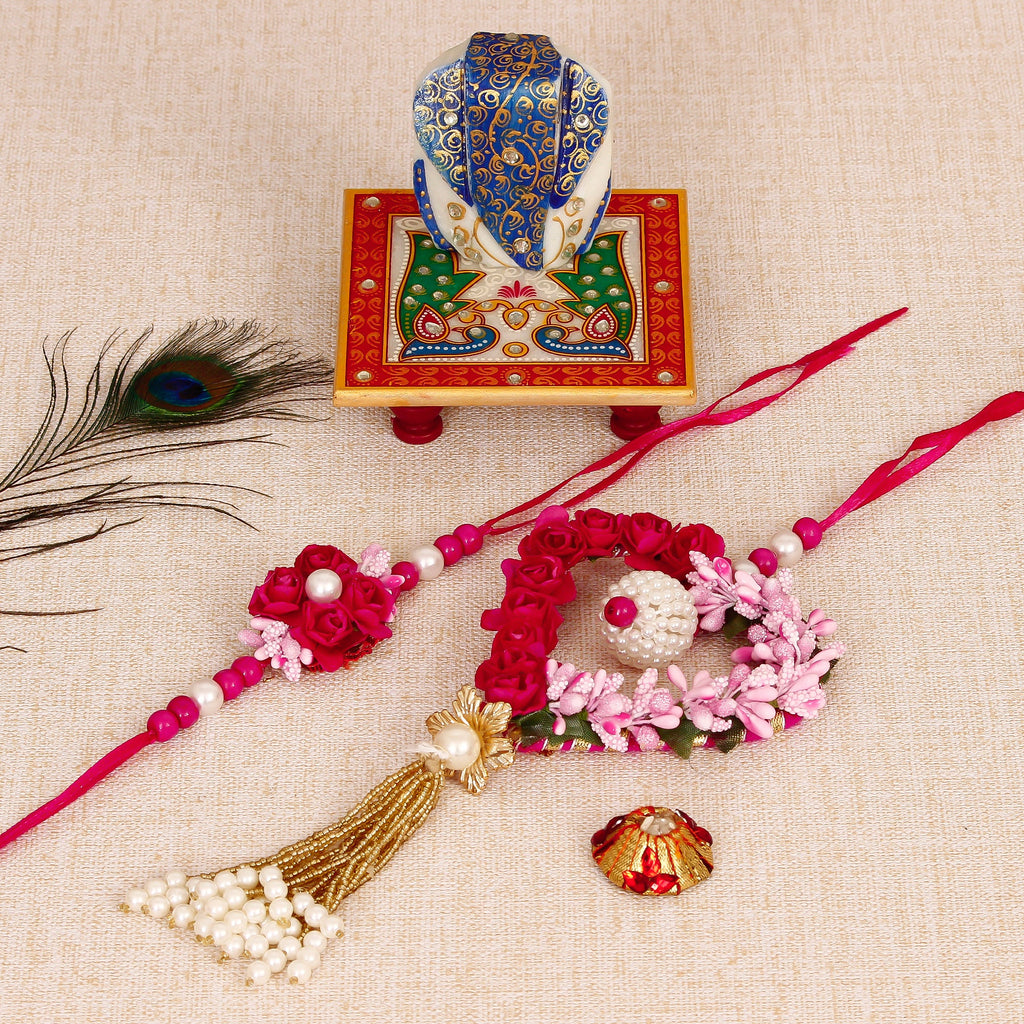 Floral and Heart Shape Bhaiya Bhabhi Rakhi with Lord Ganesha on Marble Chowki and Roli Tikka Matki Kafalo
