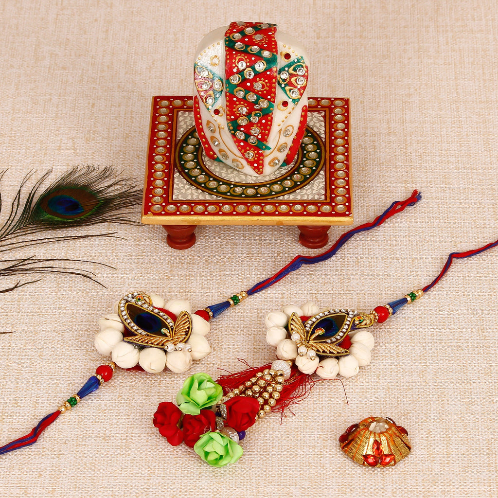 Bhaiya Bhabhi Rakhi with Lord Ganesha on Kundan Studded Marble Chowki and Roli Tikka Matki Kafalo