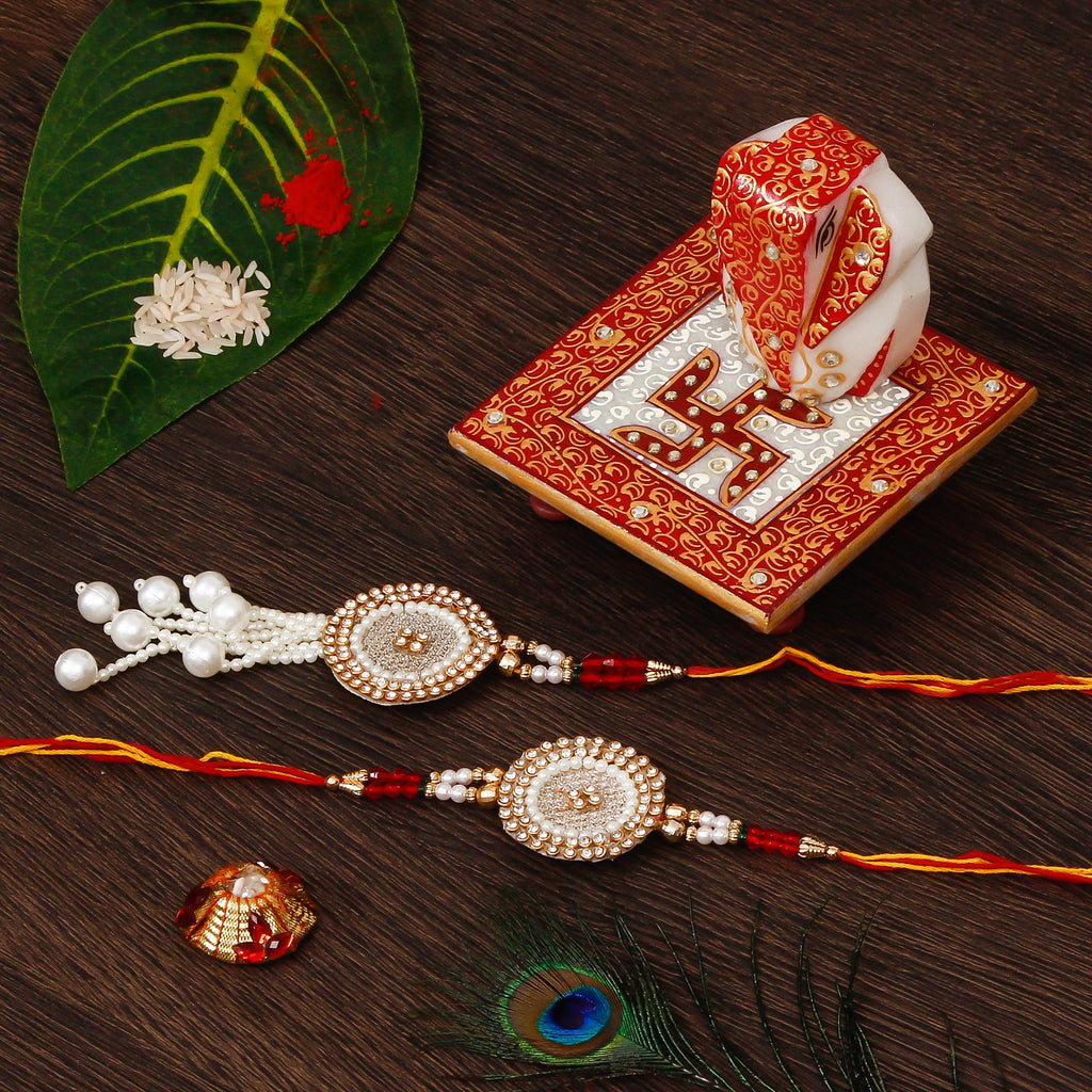 Bhaiya Bhabhi Rakhi with Ridhi Sidhi Marble chowki and Roli Tikka Matki Kafalo