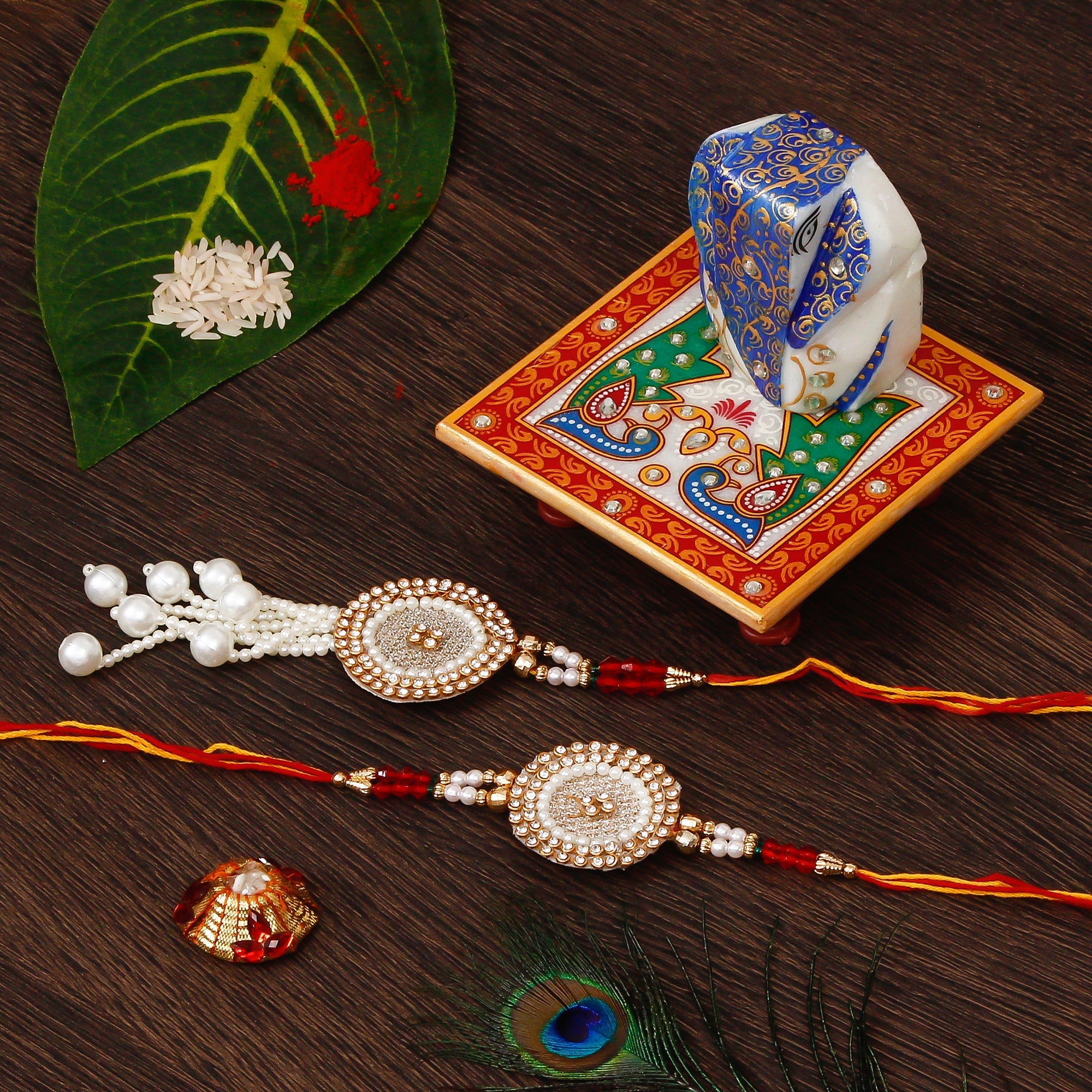 Bhaiya Bhabhi Rakhi with Lord Ganesha on Marble Chowki and Roli Tikka Matki Kafalo