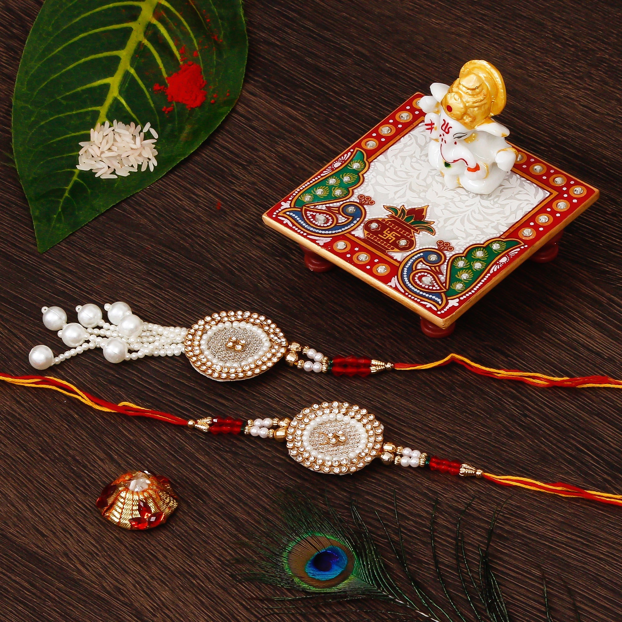 Bhaiya Bhabhi Rakhi with Lord Ganesha Marble Chowki and Roli Tikka Matki Kafalo