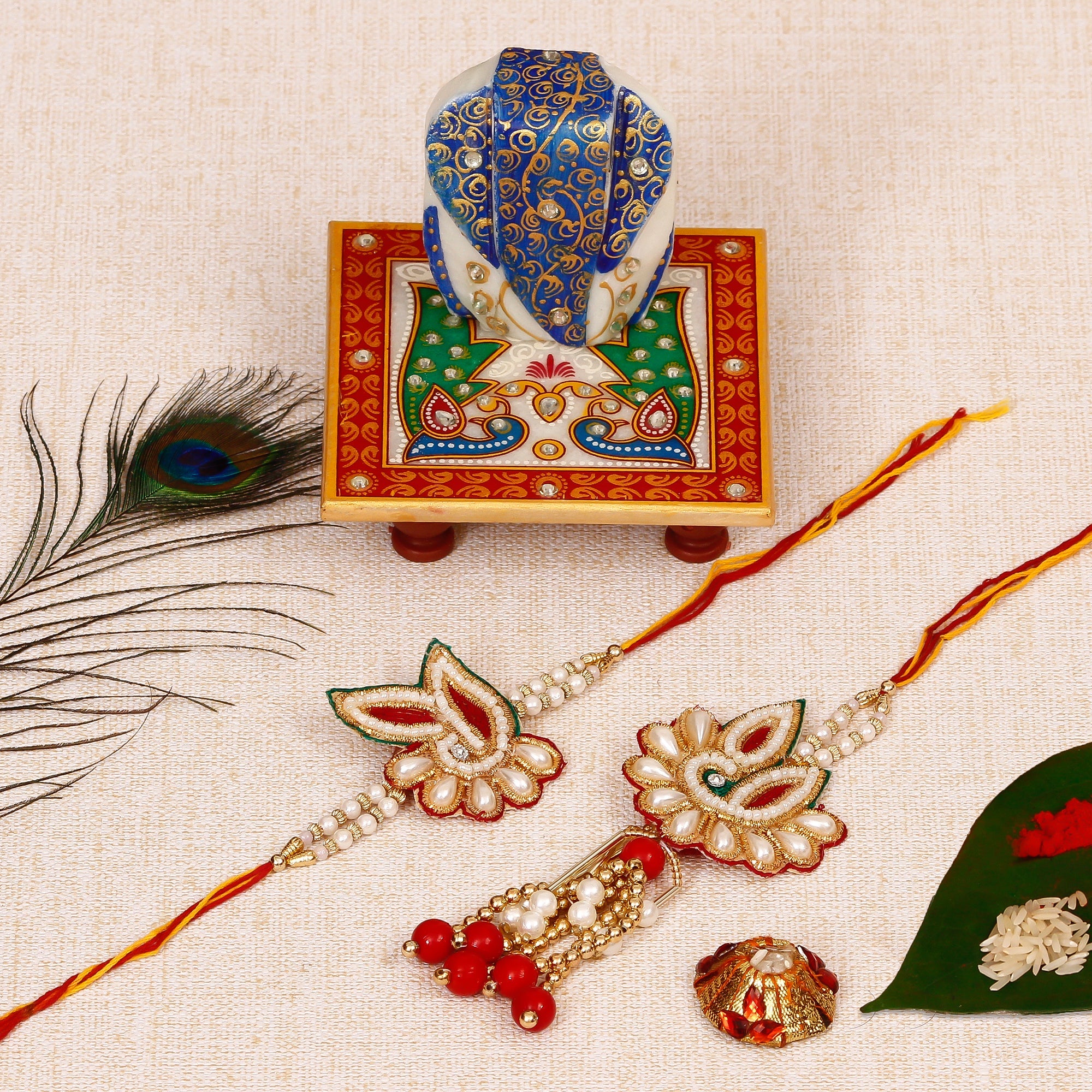 Bhaiya Bhabhi Rakhi with Lord Ganesha on Marble Chowki and Roli Tikka Matki Kafalo