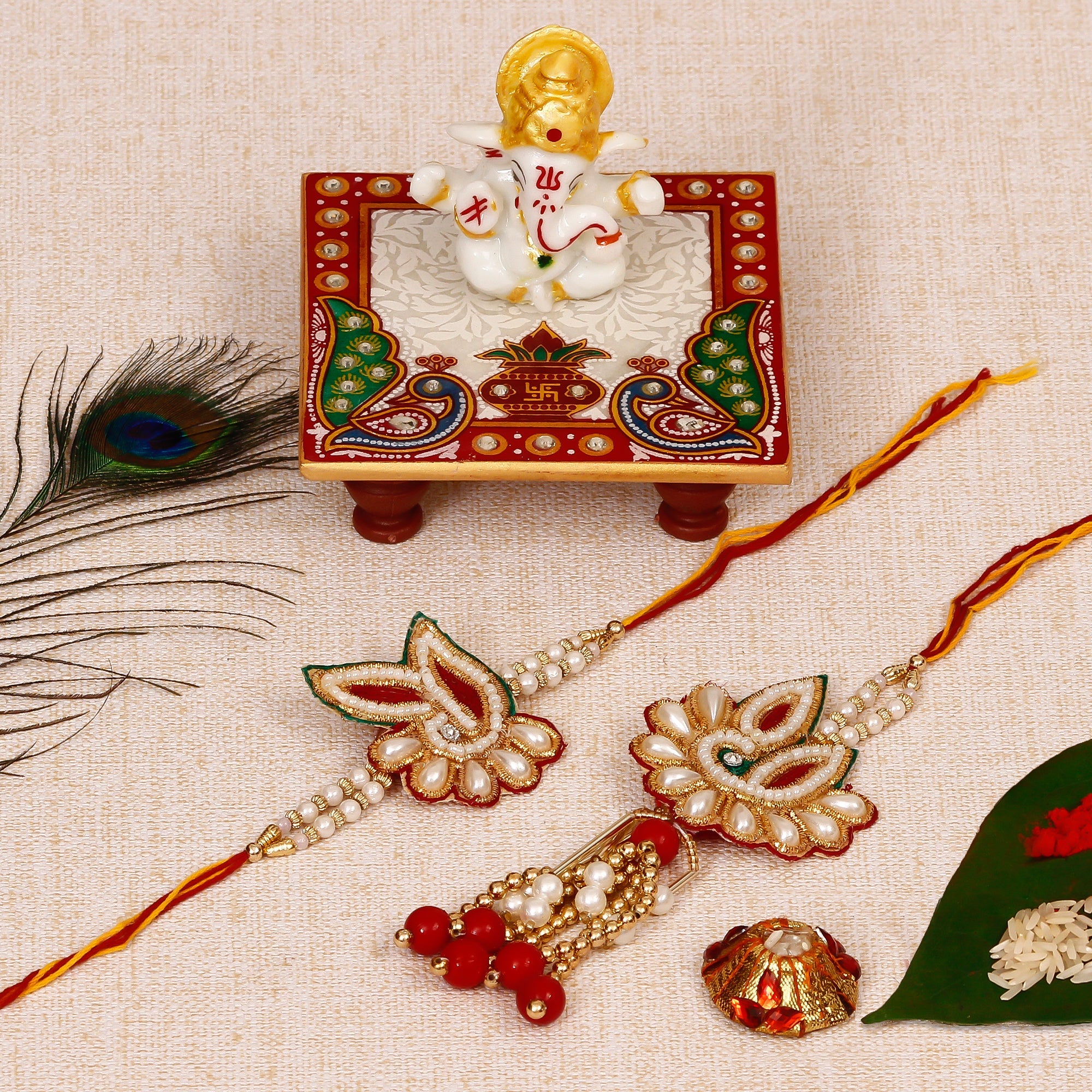 Bhaiya Bhabhi Rakhi with Lord Ganesha Marble Chowki and Roli Tikka Matki Kafalo