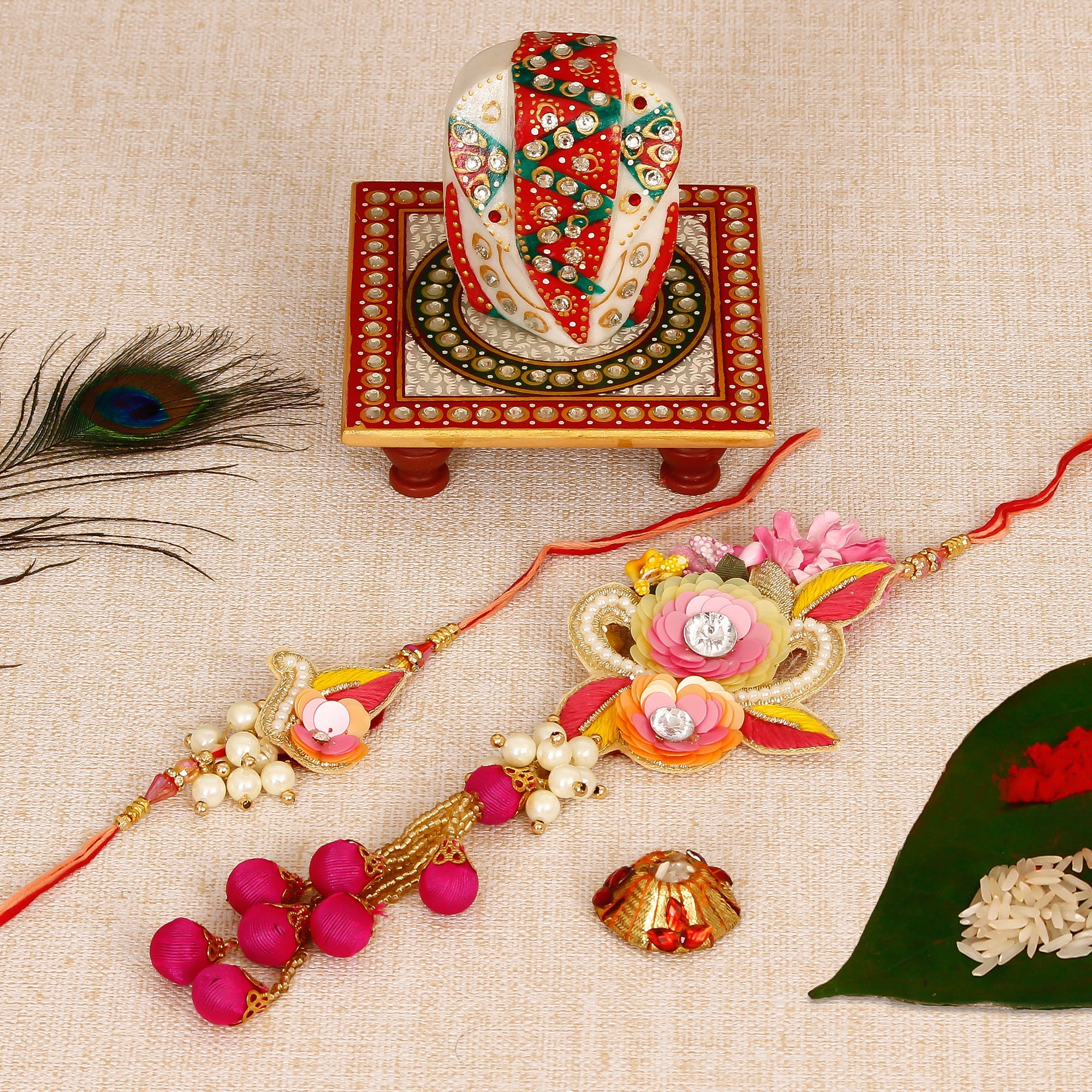 Bhaiya Bhabhi Rakhi with Lord Ganesha on Kundan Studded Marble Chowki and Roli Tikka Matki Kafalo
