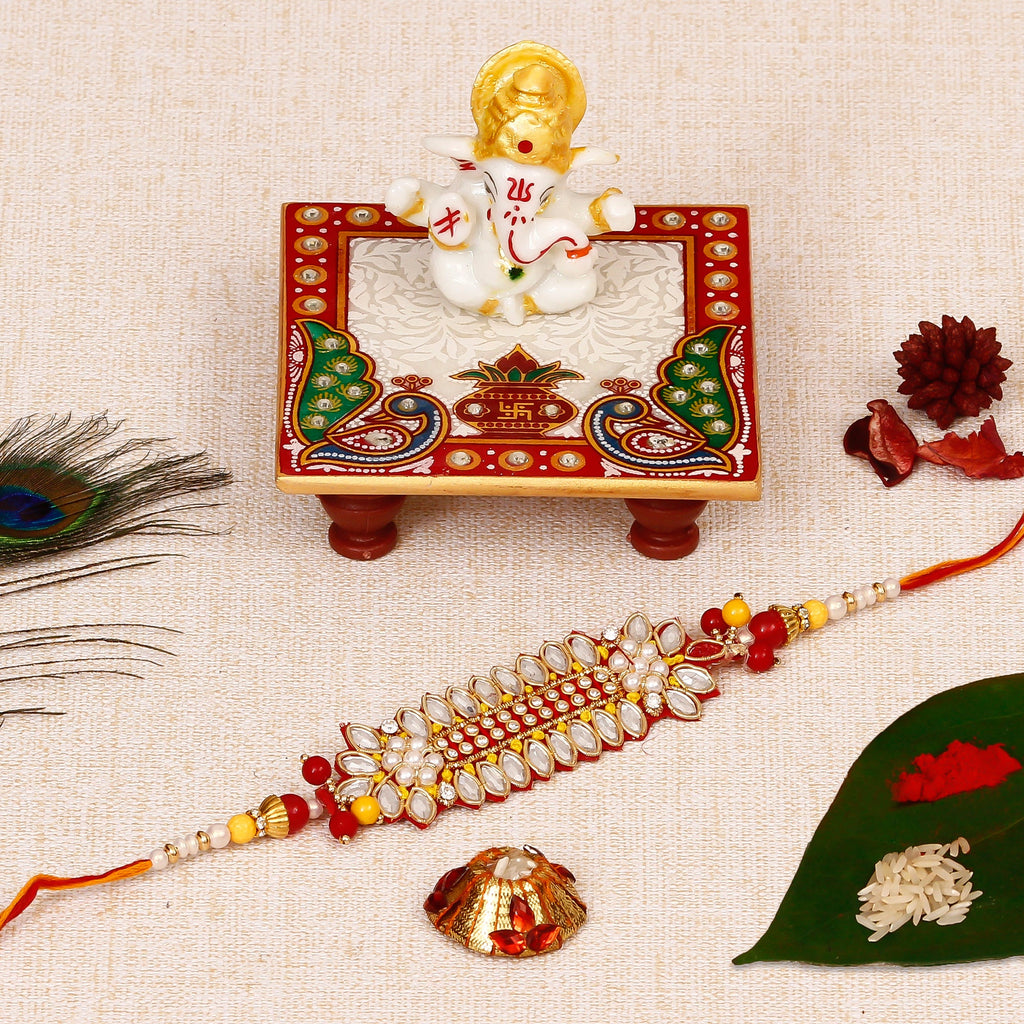 Designer Rakhi with Lord Ganesha Marble Chowki and Roli Tikka Matki Kafalo