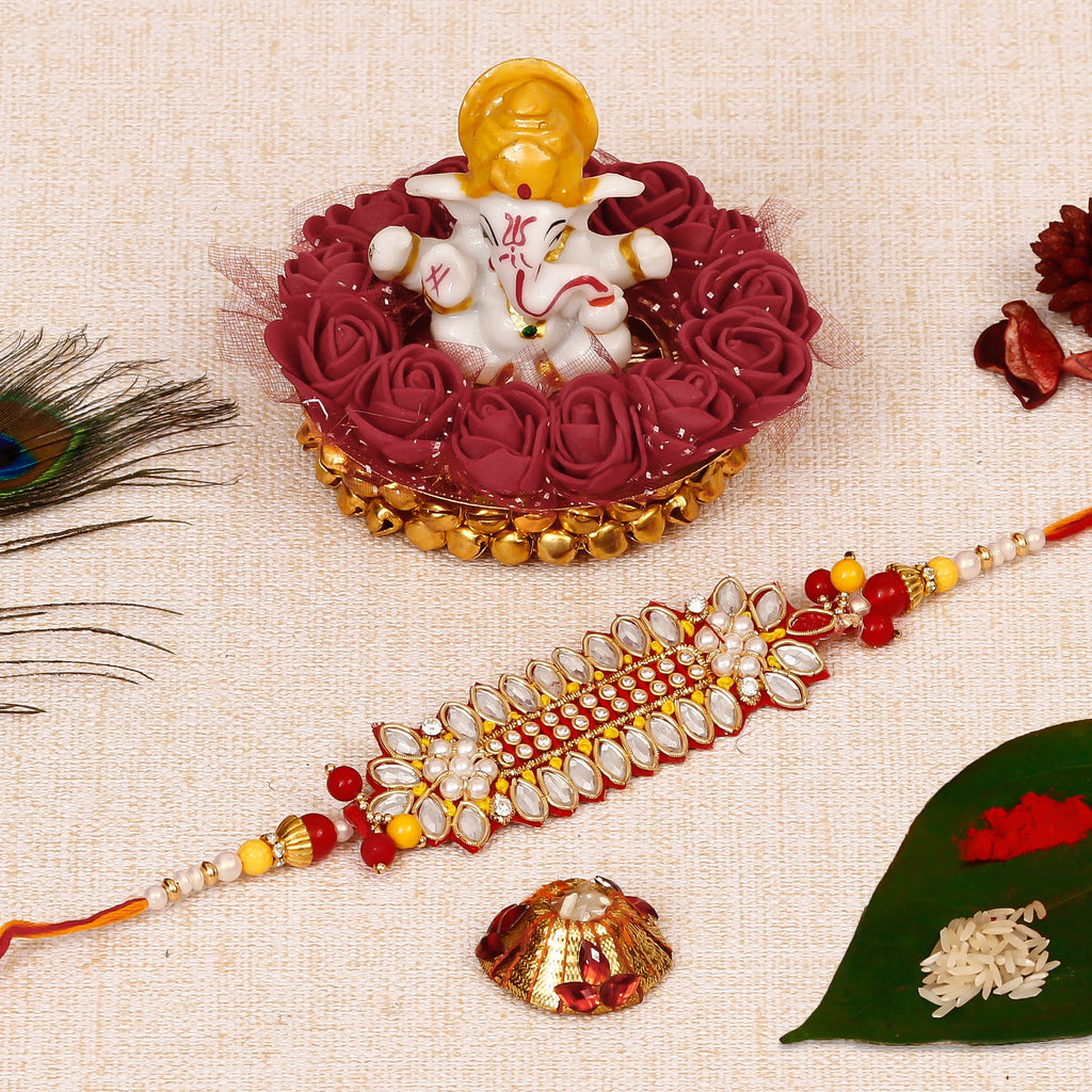 Designer Rakhi with Lord Ganesha Idol on Decorative Plate for Car & Home and Roli Tikka Matki Kafalo