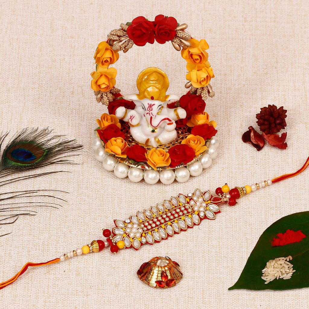 Designer Rakhi with Lord Ganesha Idol on Decorative Plate for Car & Home and Roli Tikka Matki Kafalo