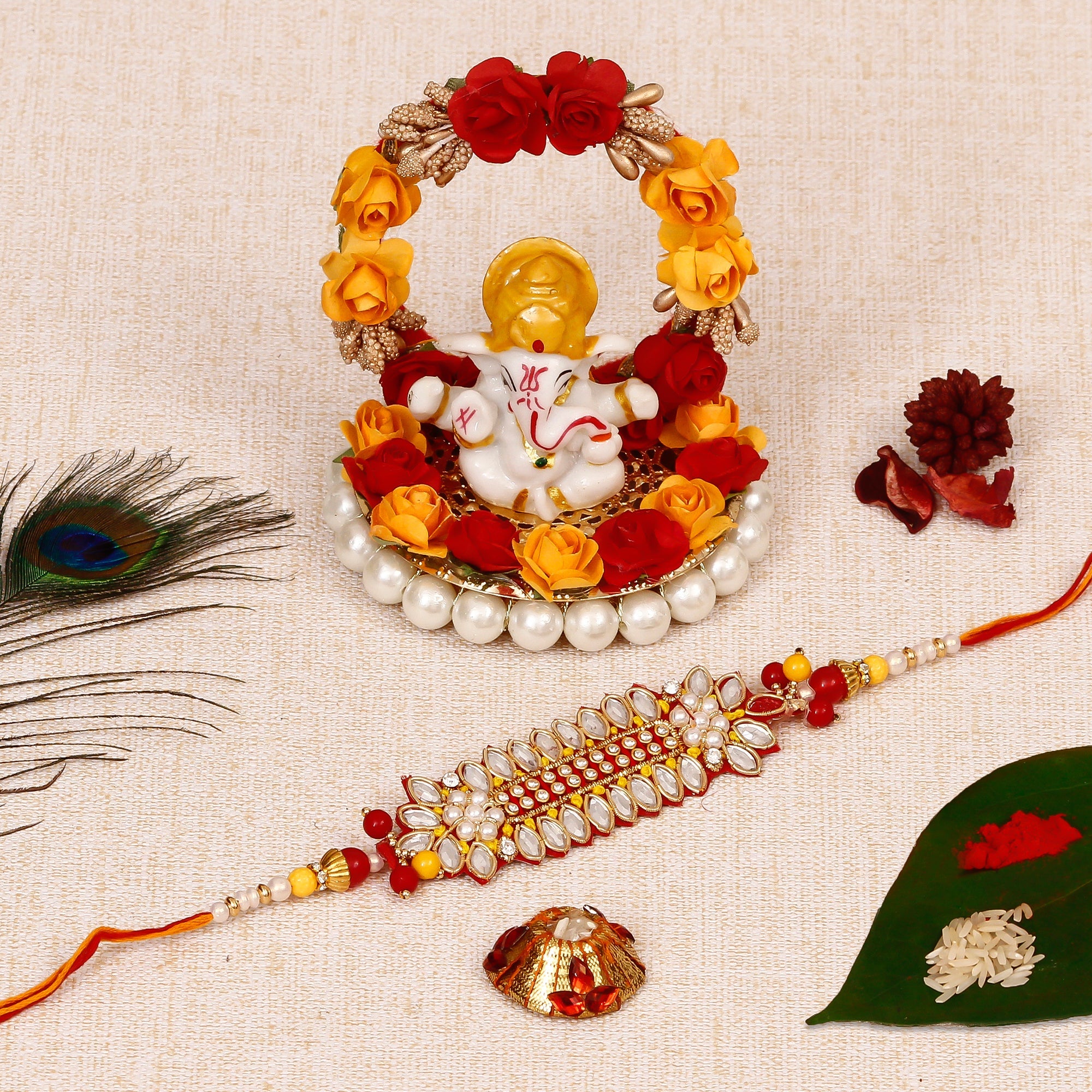 Designer Rakhi with Lord Ganesha Idol on Decorative Plate for Car & Home and Roli Tikka Matki Kafalo