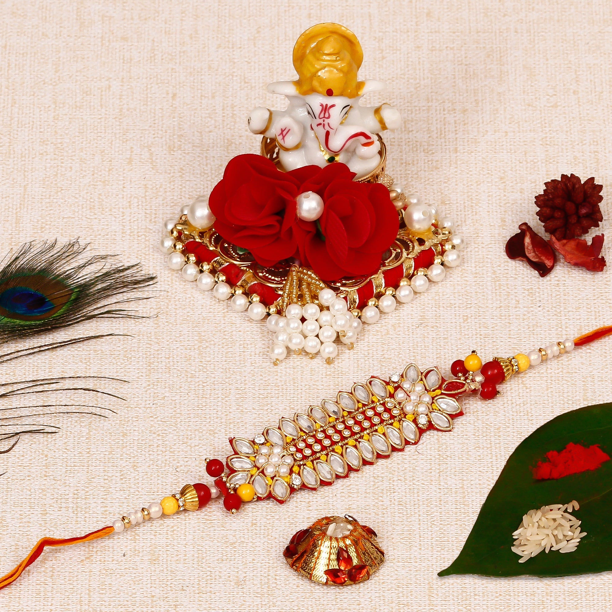 Designer Rakhi with Lord Ganesha Idol on Decorative Plate for Car & Home and Roli Tikka Matki Kafalo