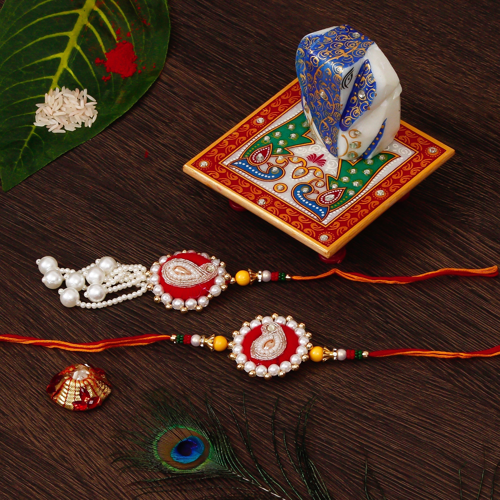 Bhaiya Bhabhi Rakhi with Lord Ganesha on Marble Chowki and Roli Tikka Matki Kafalo
