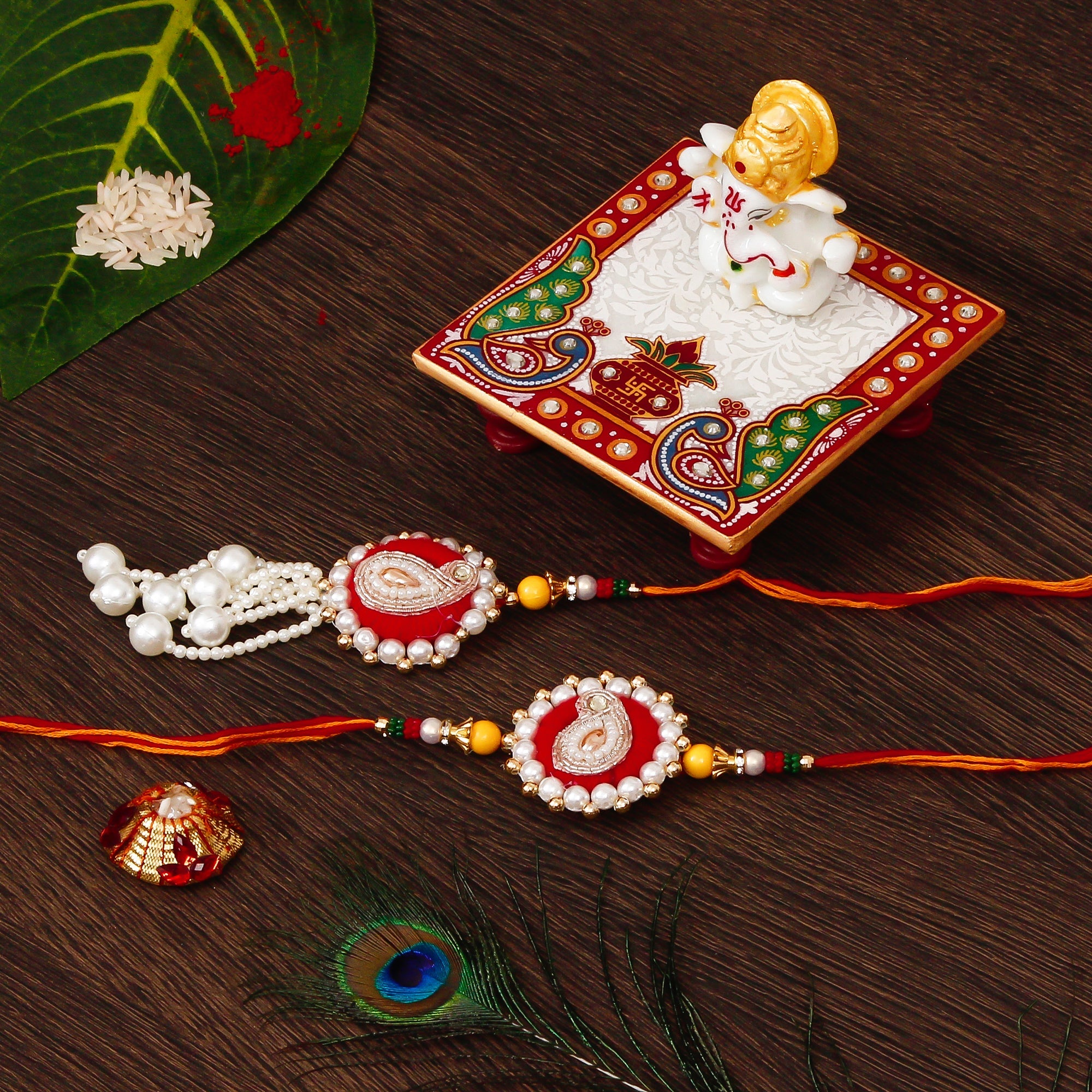Bhaiya Bhabhi Rakhi with Lord Ganesha Marble Chowki and Roli Tikka Matki Kafalo
