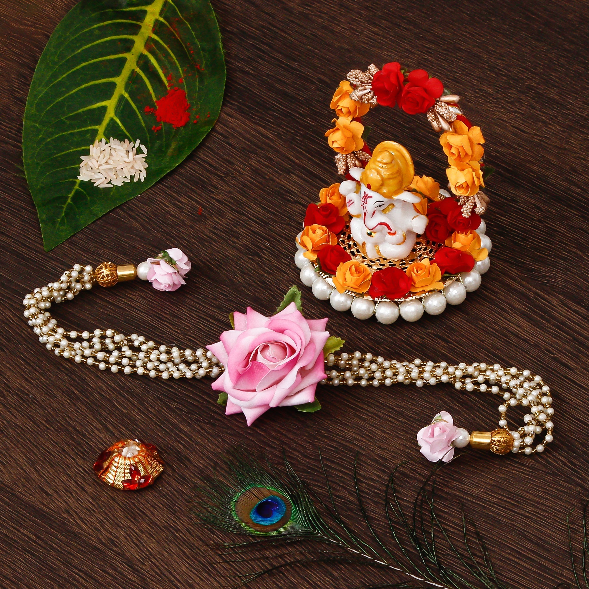 Floral Rakhi for Bhabhi with Lord Ganesha Idol on Decorative Plate for Car & Home and Roli Tikka Matki Kafalo