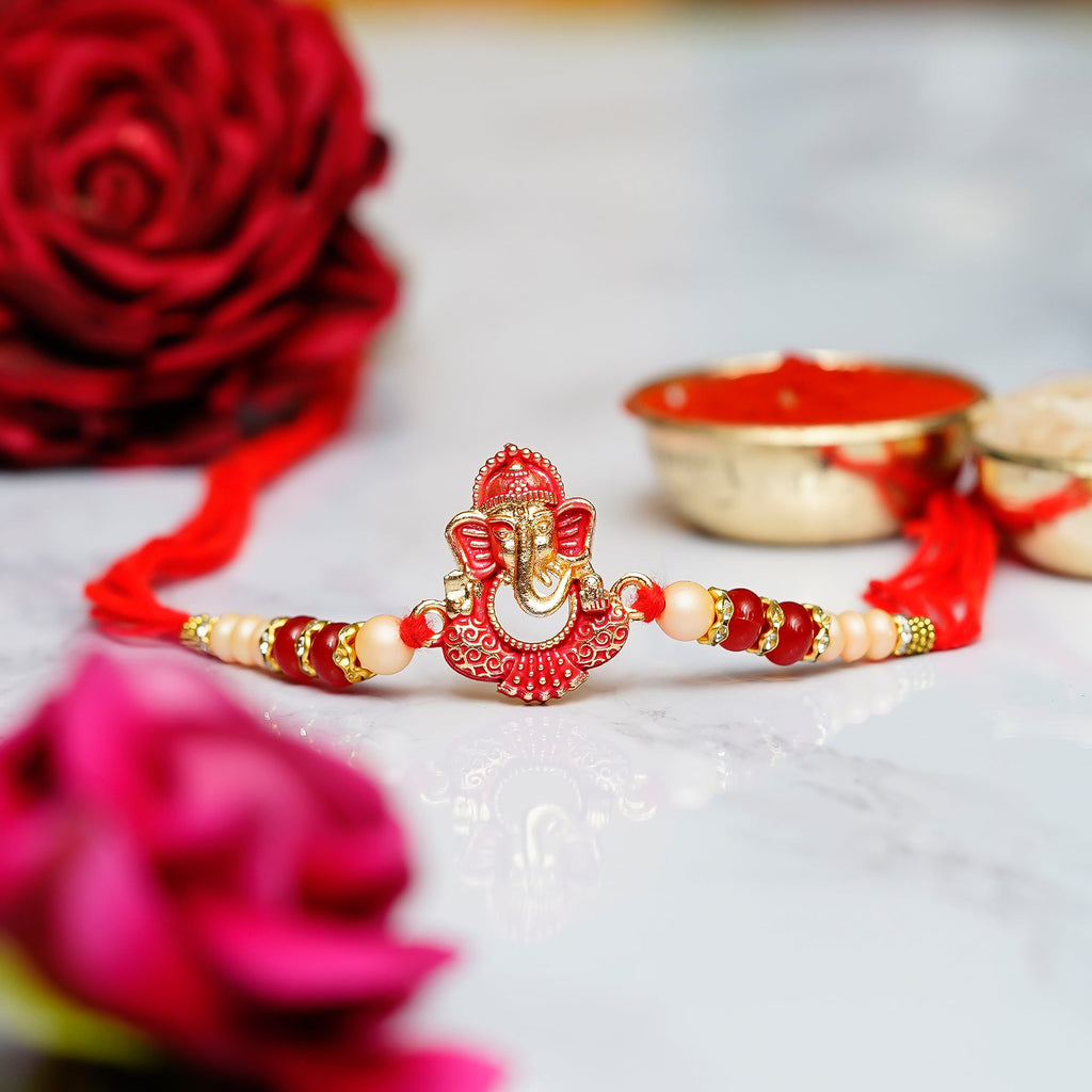 Designer Ganesha Rakhi and Roli Chawal Pack Kafalo