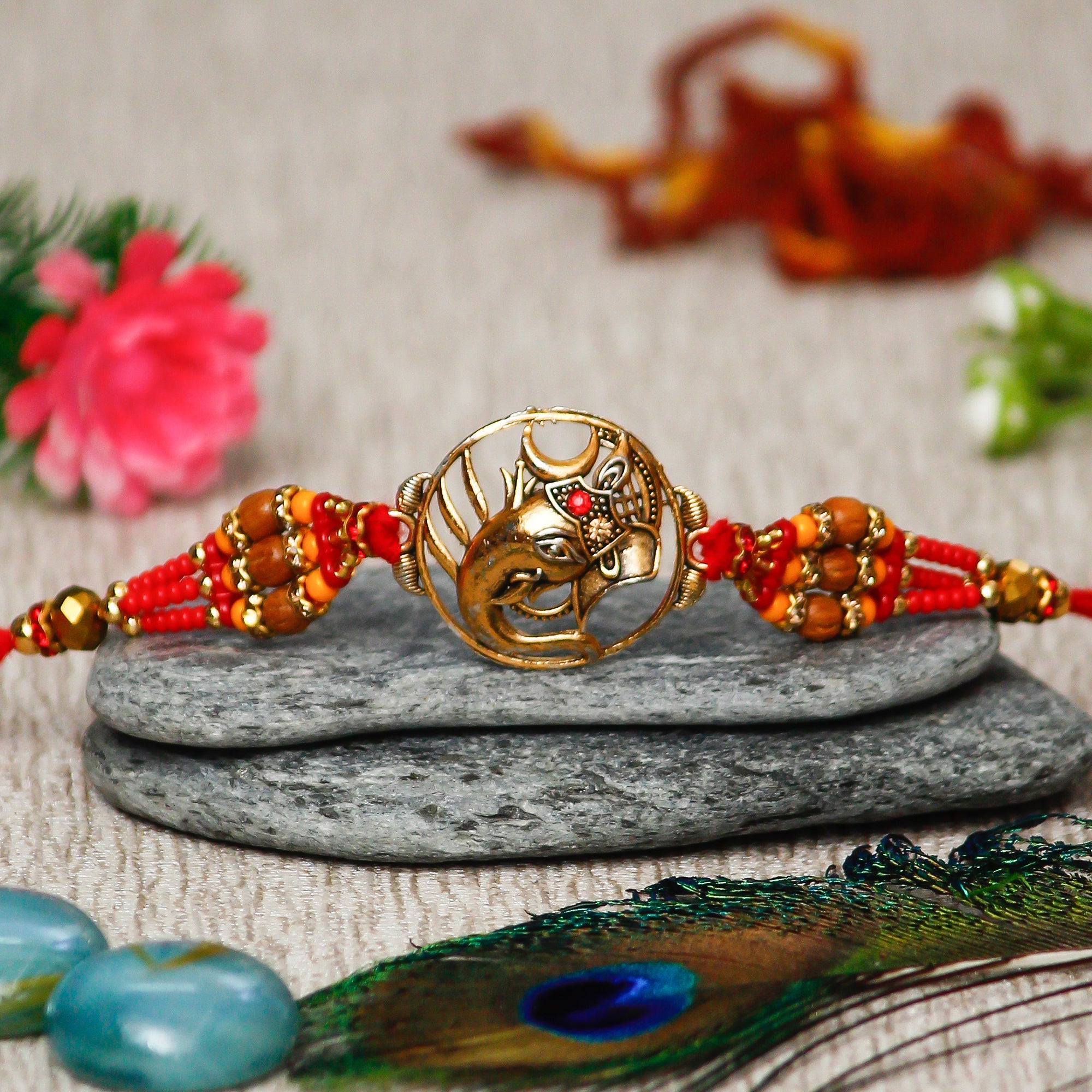 Designer Ganesha Rakhi and Roli Chawal Pack Kafalo