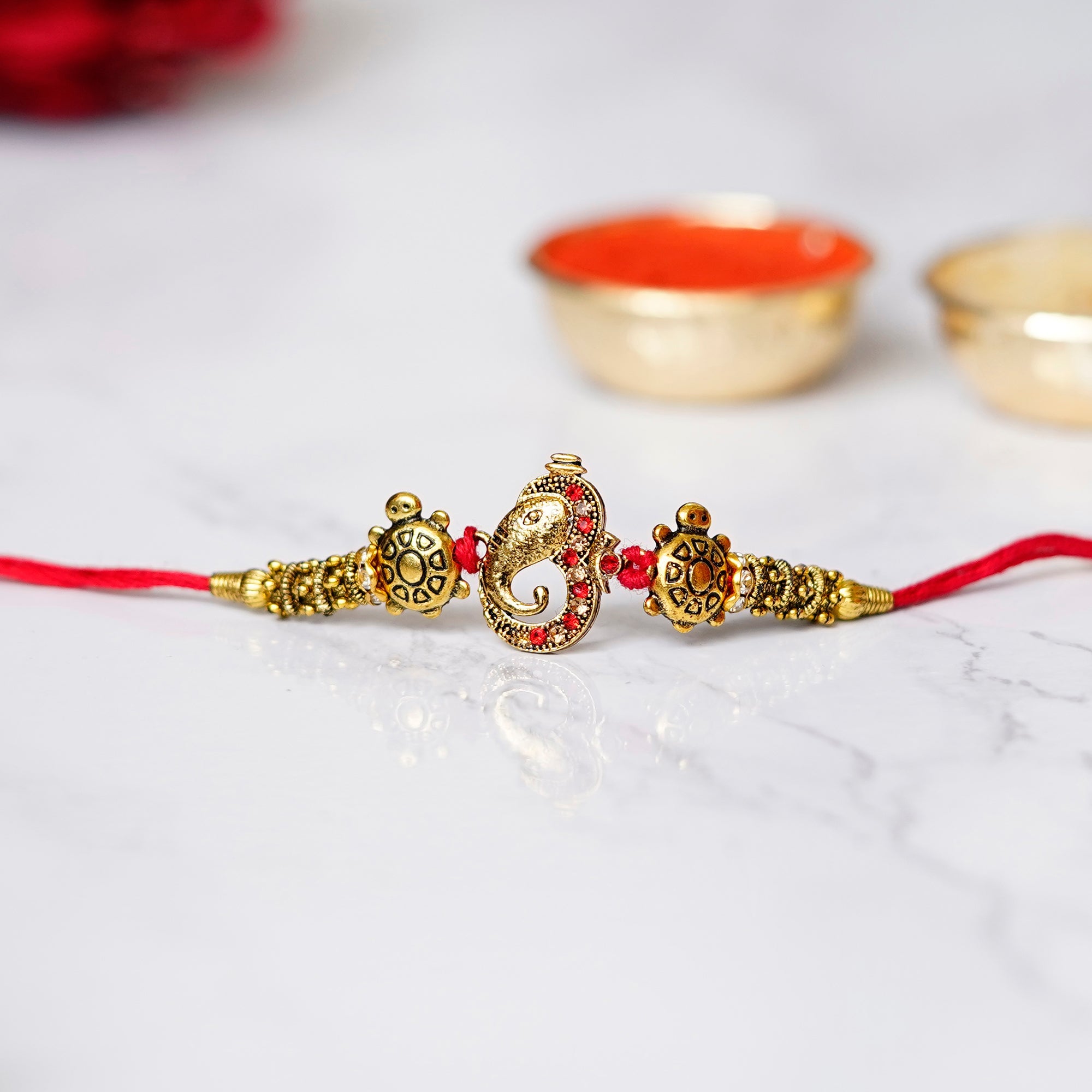 Designer Ganesha Rakhi and Roli Chawal Pack Kafalo