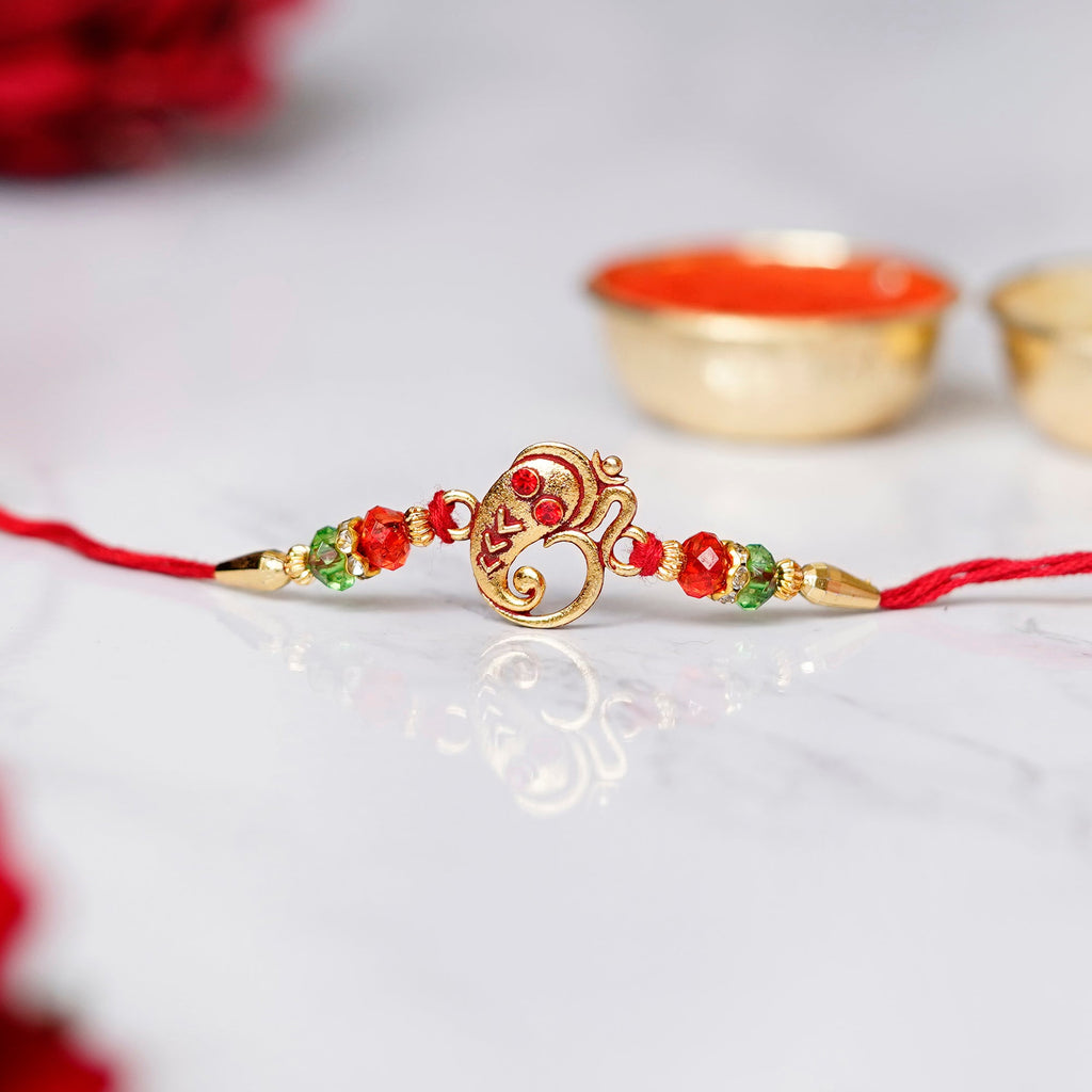 Designer Ganesha Rakhi and Roli Chawal Pack Kafalo