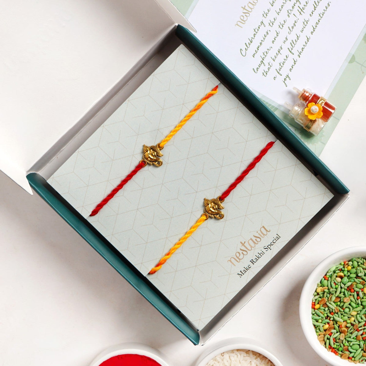Shubh Ganesh Rakhi Duo Set Nestasia