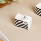 Wavy Ceramic Salt And Pepper Shakers Set Black And White Nestasia