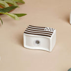Wavy Ceramic Salt And Pepper Shakers Set Black And White Nestasia
