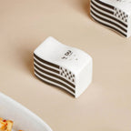 Wavy Ceramic Salt And Pepper Shakers Set Black And White Nestasia