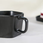 Pentagon Mug with Saucer Black Nestasia