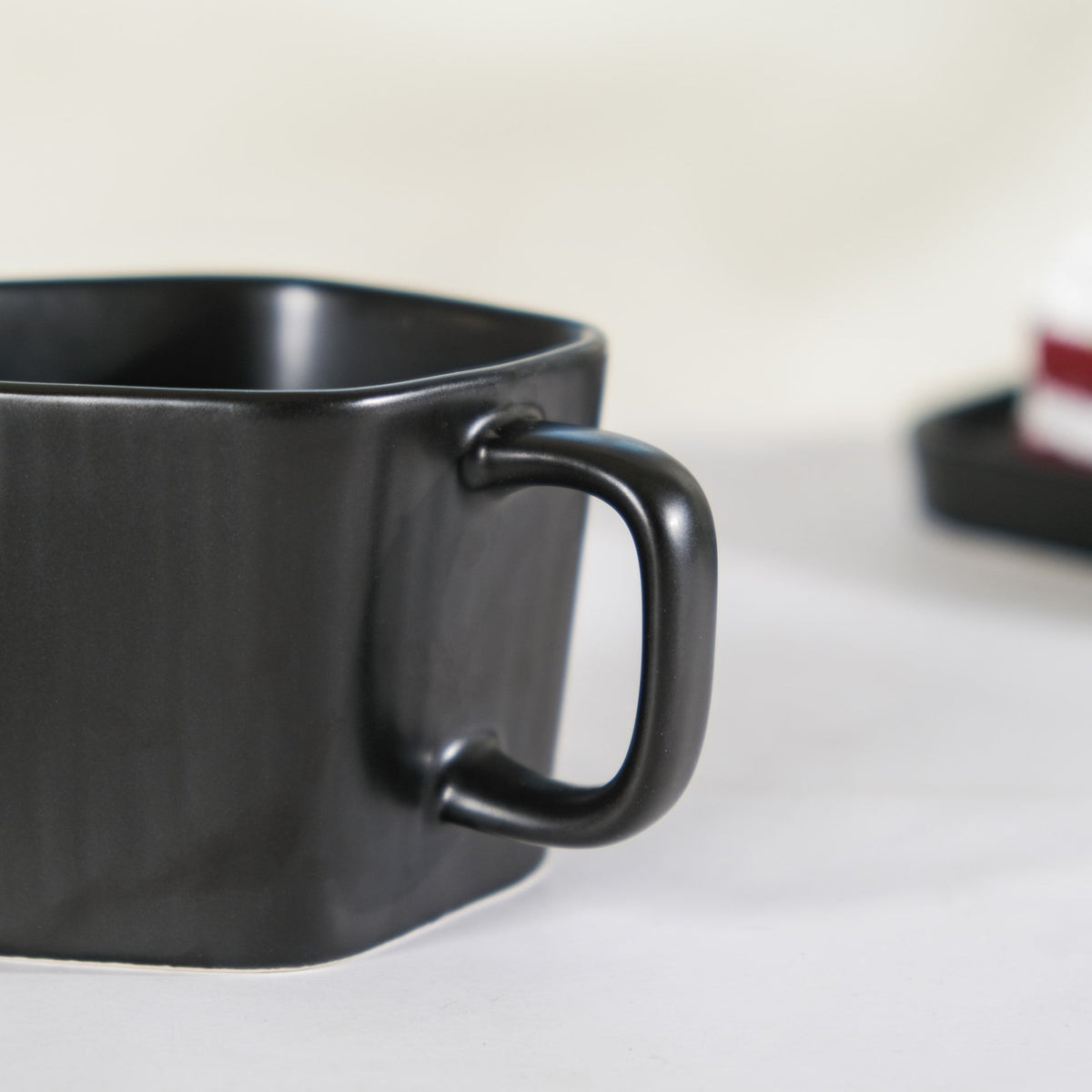 Pentagon Mug with Saucer Black Nestasia