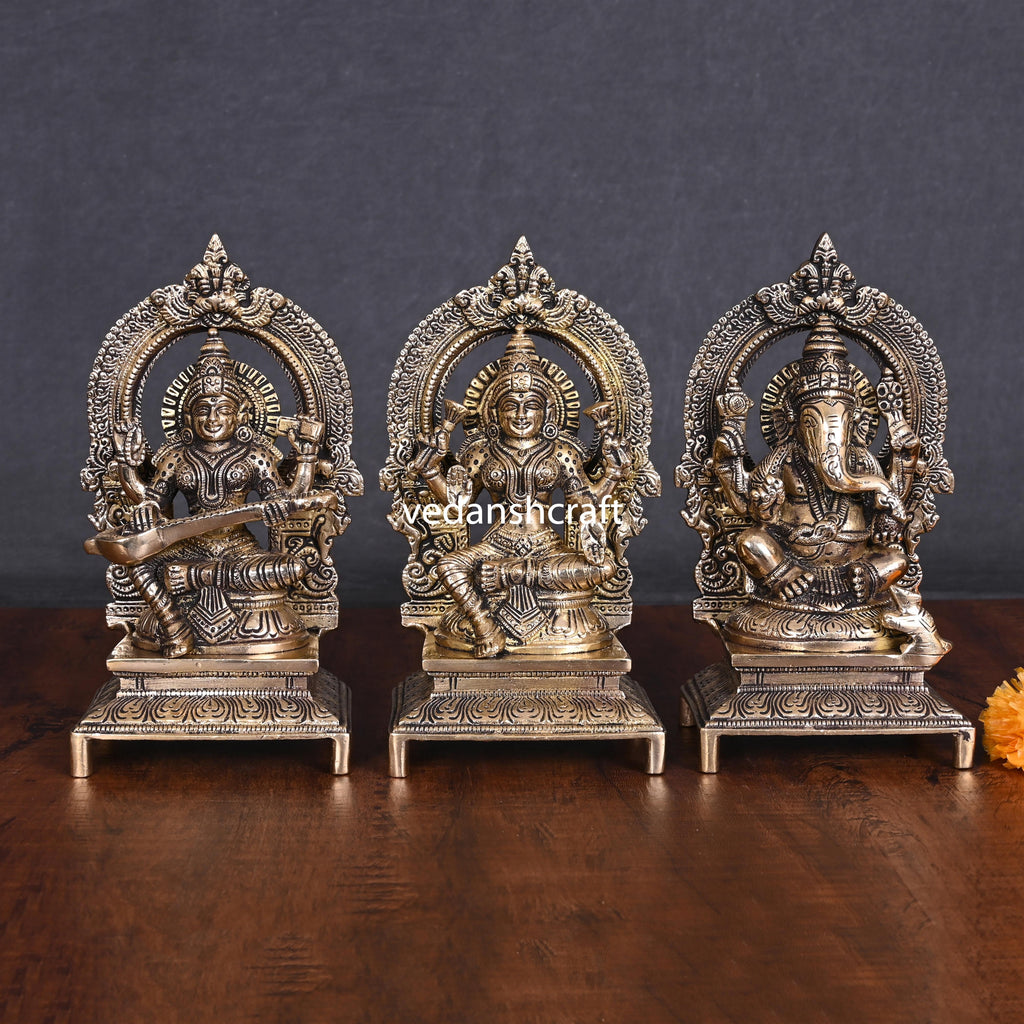 Brass Sitting Lakshmi, Ganesha, And Saraswati On Throne Set (7.5 Inch) Vedansh Craft