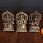 Brass Sitting Lakshmi, Ganesha, And Saraswati On Throne Set (7.5 Inch) Vedansh Craft