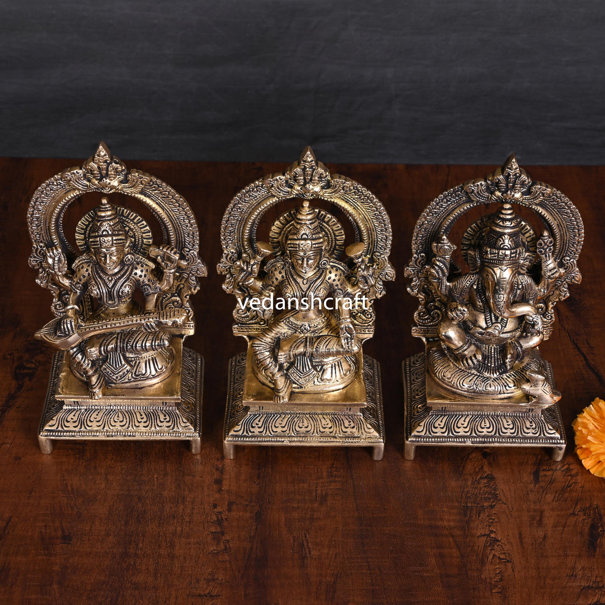 Brass Sitting Lakshmi, Ganesha, And Saraswati On Throne Set (7.5 Inch) Vedansh Craft