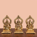 Brass Sitting Lakshmi, Ganesha, And Saraswati On Throne Set (8 Inch) Vedansh Craft