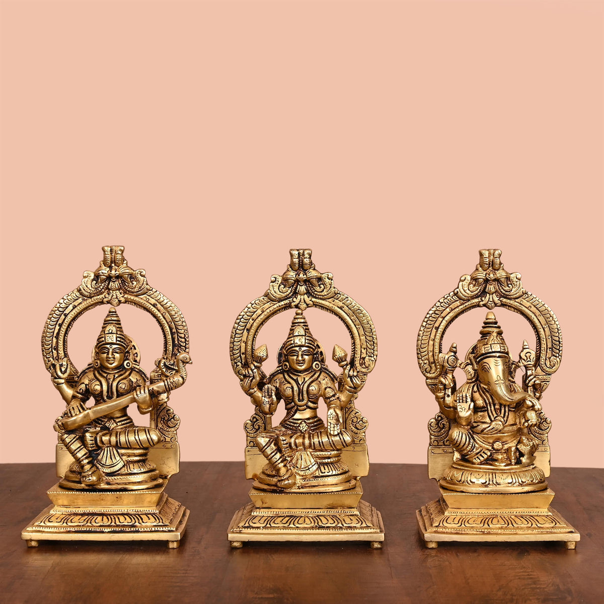Brass Sitting Lakshmi, Ganesha, And Saraswati On Throne Set (8 Inch) Vedansh Craft