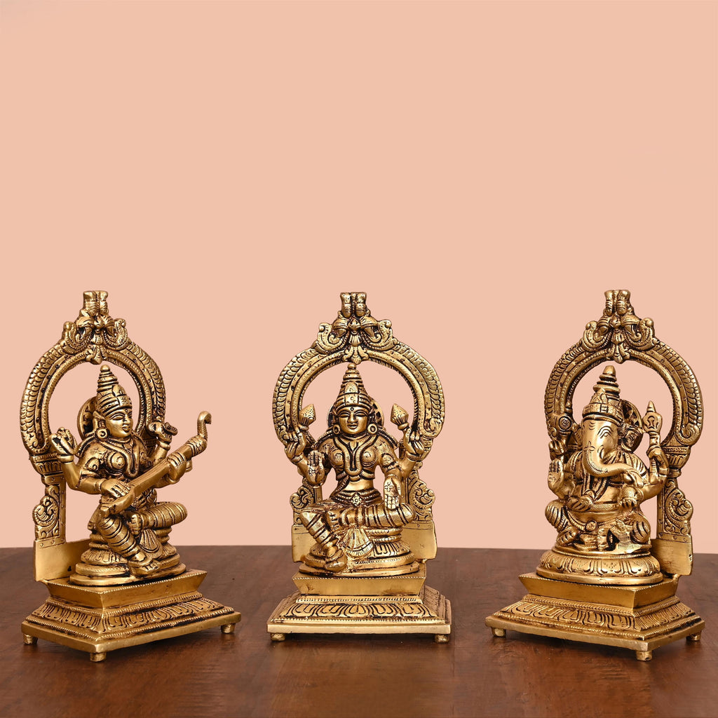 Brass Sitting Lakshmi, Ganesha, And Saraswati On Throne Set (8 Inch) Vedansh Craft
