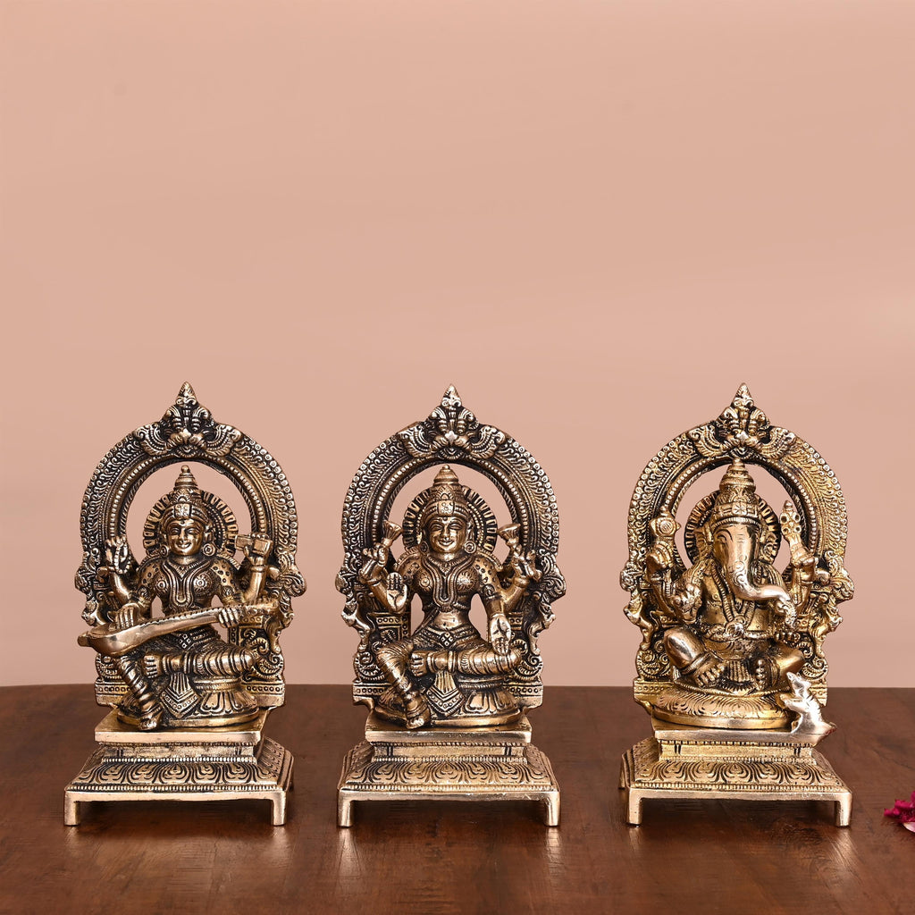 Brass Sitting Lakshmi, Ganesha, And Saraswati On Throne Set (7.5 Inch) Vedansh Craft