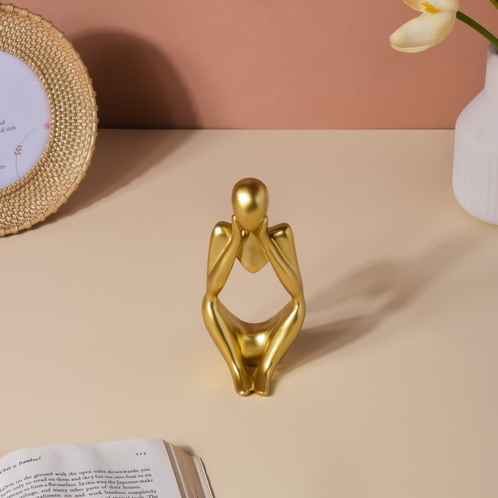 Gold Sitting Showpiece In Thought Nestasia