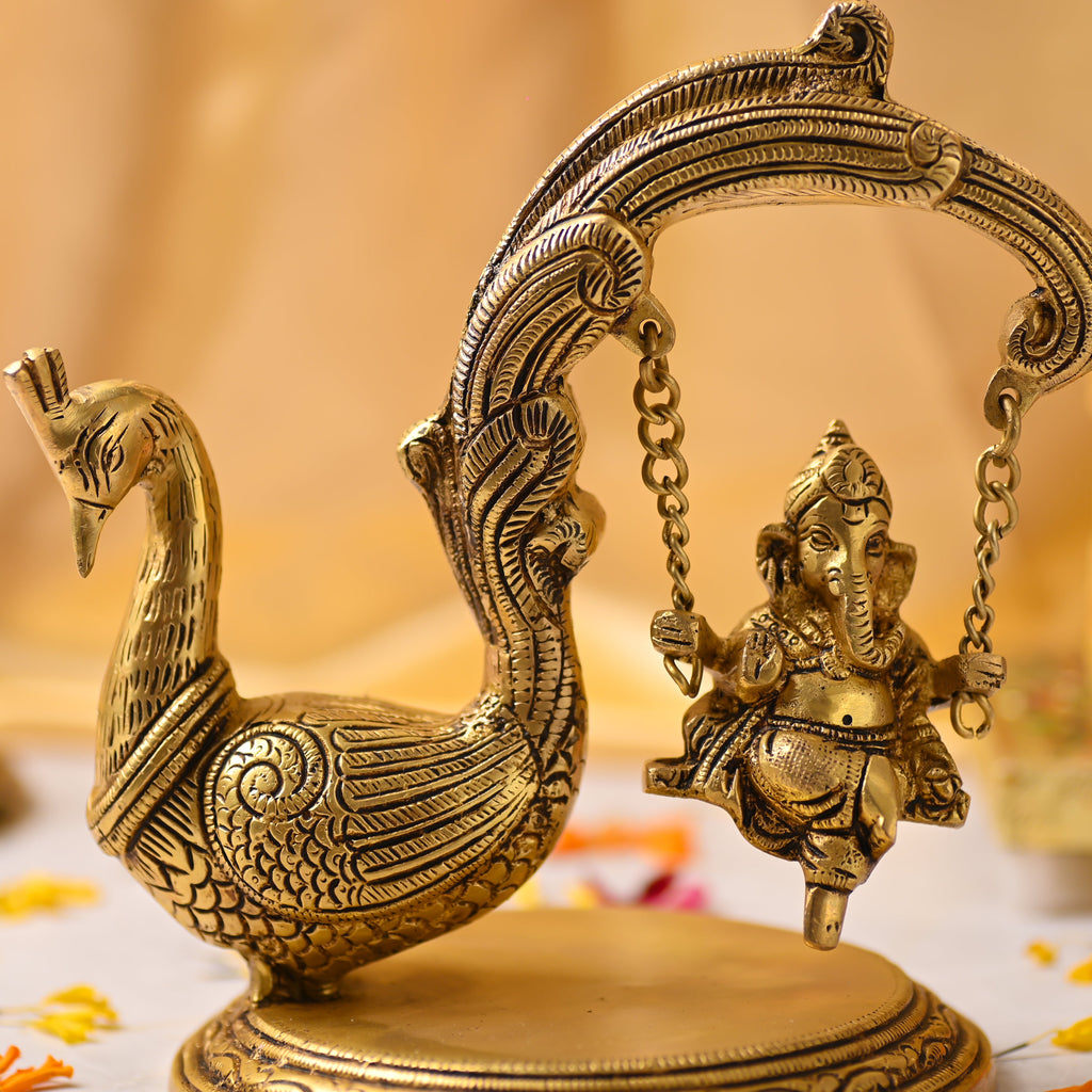 Brass Peacock Jhula with Ganesha Idol – Premium Decor (8 Inch) Vedansh Craft