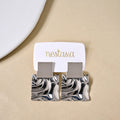 Dangling Hammered Silver Statement Earrings Nestasia