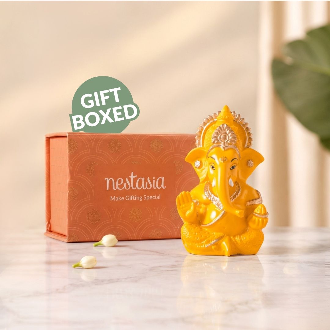 Mini Ganesh Idol For Home And Office Yellow 9cm Nestasia