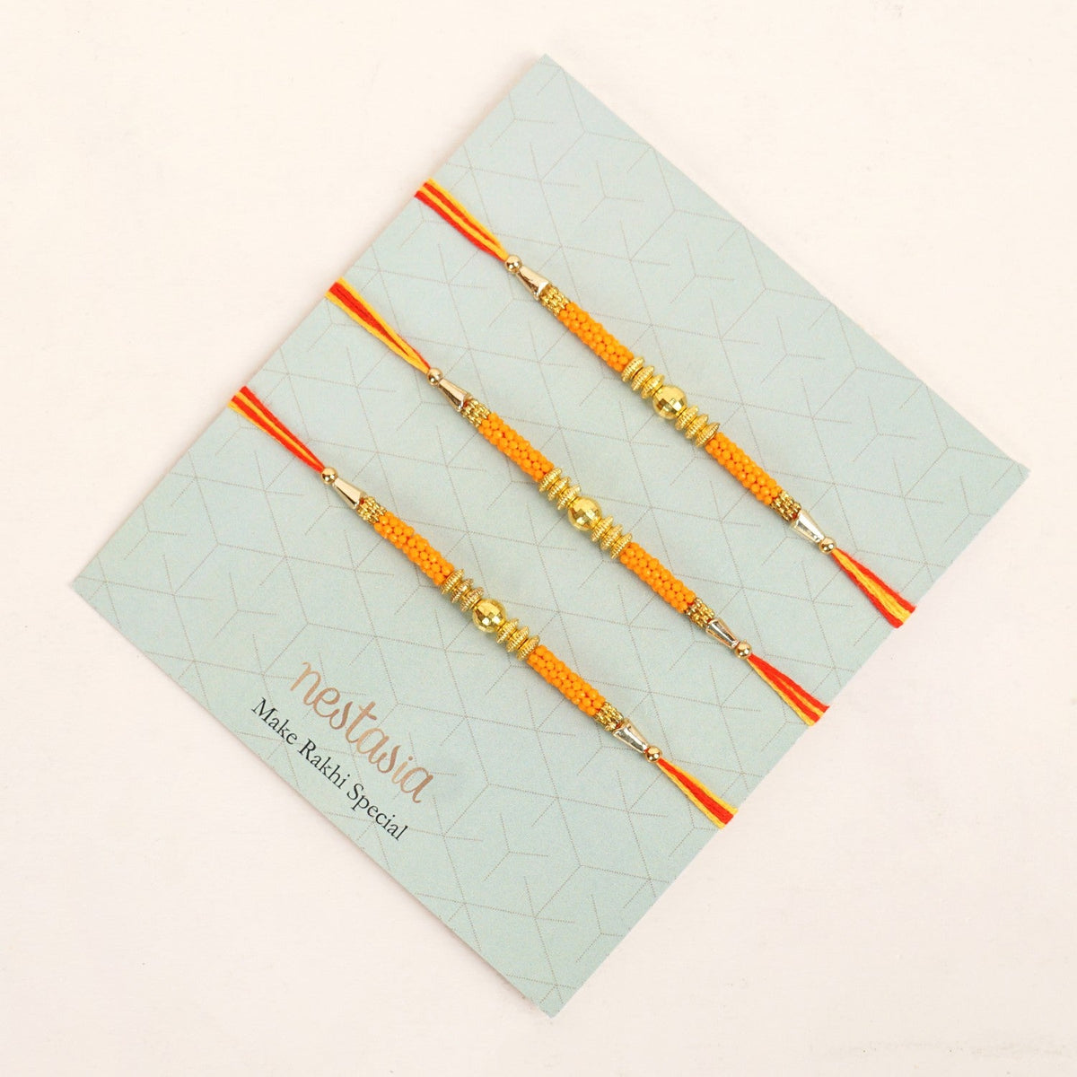 Golden Beads Orange Rakhi Gift Set Nestasia