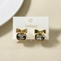 Golden Bow Jeweled Studs Nestasia