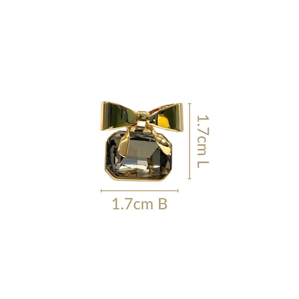 Golden Bow Jeweled Studs Nestasia