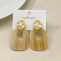 Hammered Metal Beige Danglers Nestasia