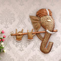 Lord Ganesha Playing Flute Musical instrument Iron Wall Hanging (Brown and Golden) Kafalo