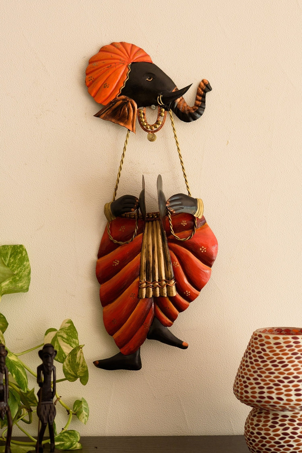 Orange and Black Wrought Iron Lord Ganesha playing Taal Wall Hanging Kafalo