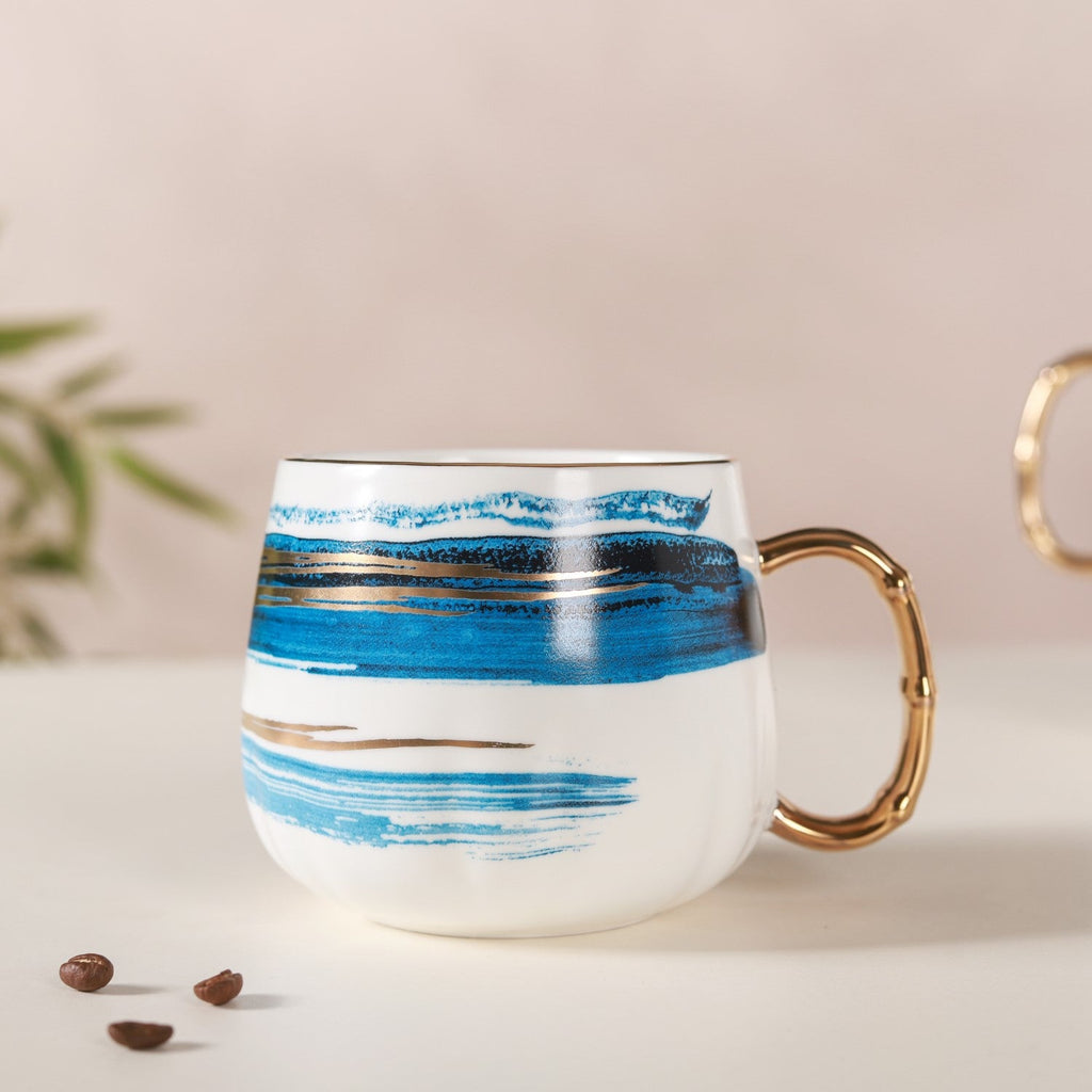 Abstract Golden Handle Cup Nestasia
