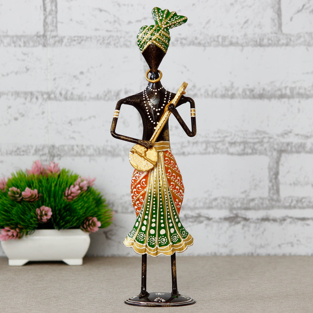 Iron Tribal Man Figurine Playing Dholak Musical Instrument Decorative Showpiece (Black, Blue and Red) Kafalo