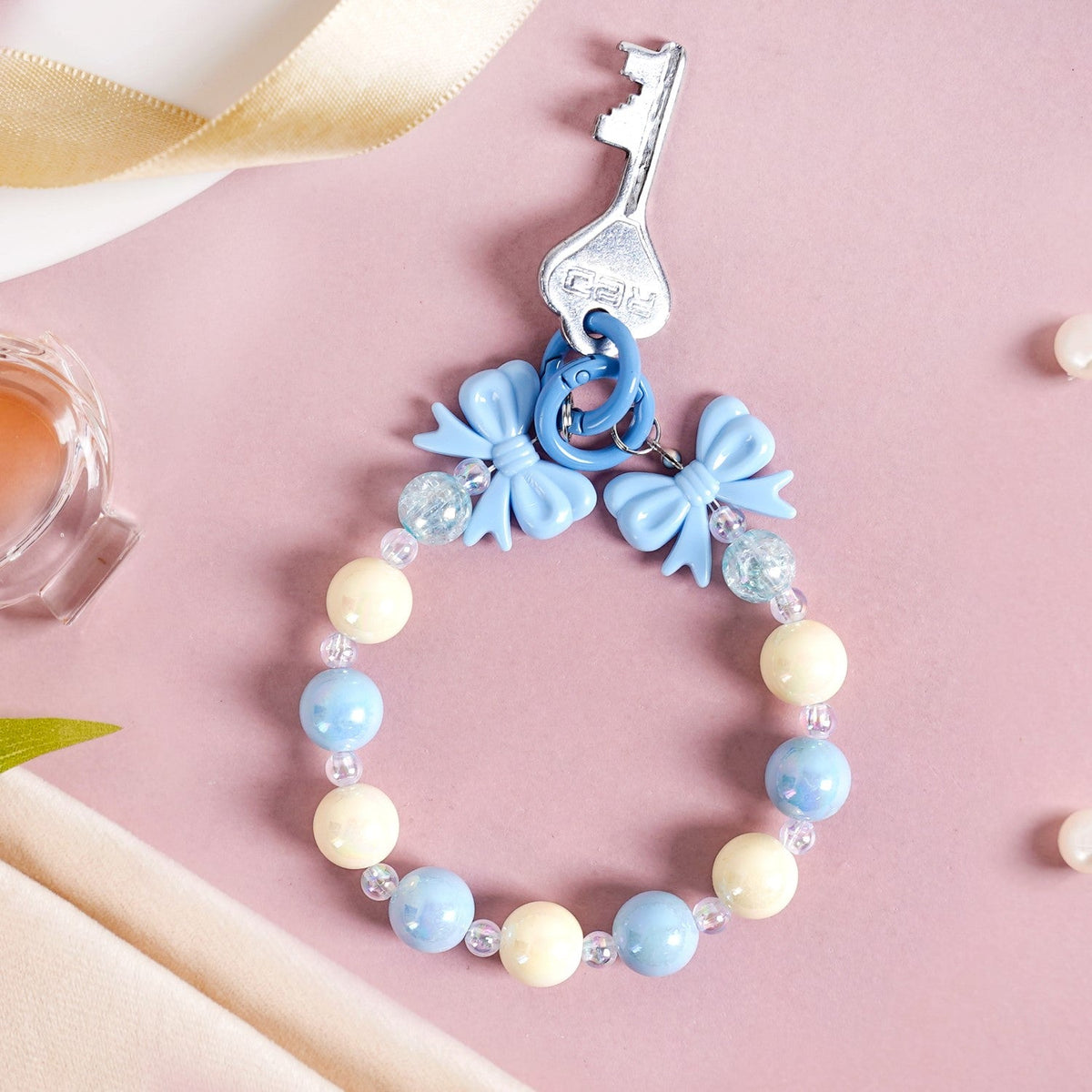 Bow Tied Blues Keychain Nestasia