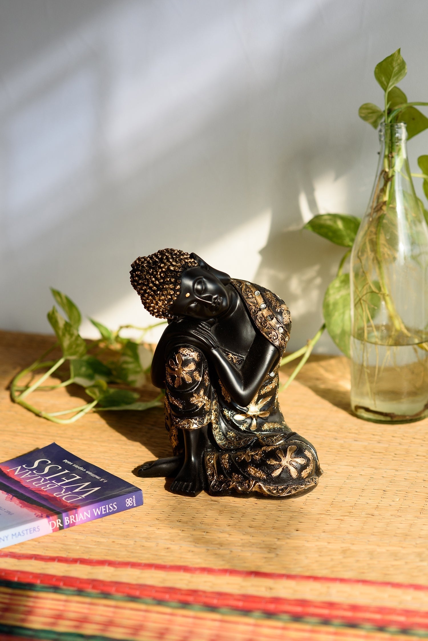 Polyresin Black and golden Resting Buddha on Knee Statue Kafalo